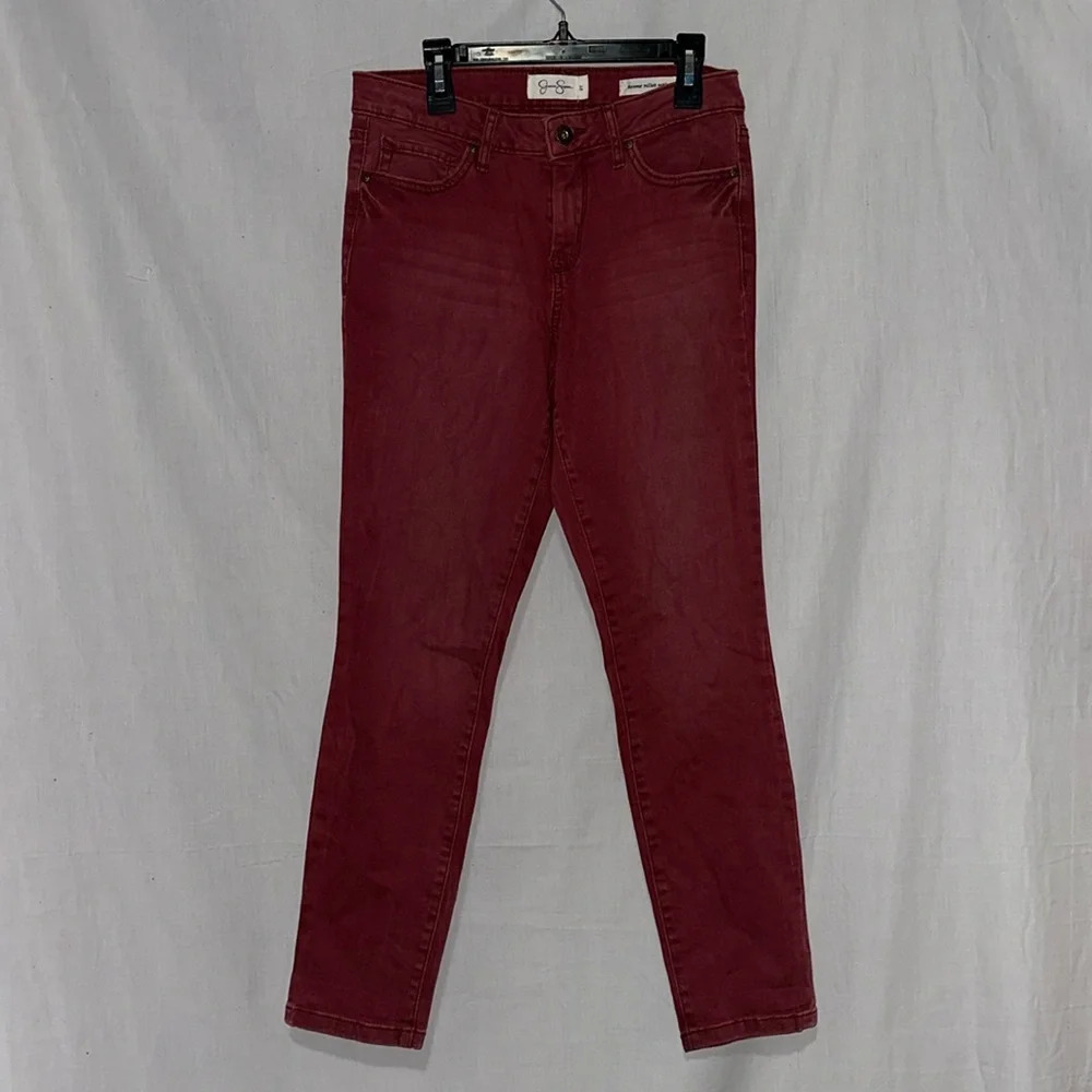 faded red Jessica Simpson forever rolled ankle jeans size 27